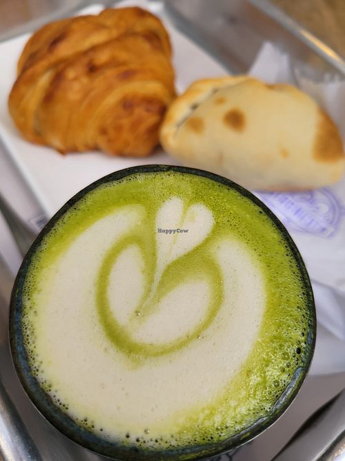 Matcha latte and croissant at Astronauta in Sao Paulo