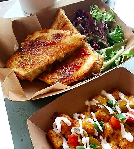 Sandwich and tots  at & Juice Co in Columbus