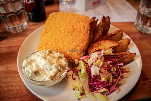 fried cheese with baked potatoes and tartar sauce at Bubu's Pub & Kitchen in Prague