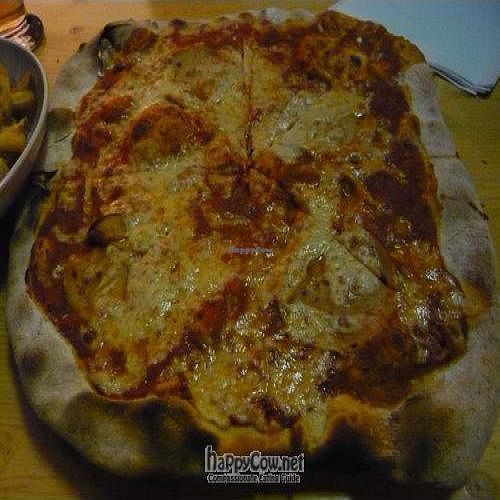 Vegan stone baked salami pizza at Yoyo Foodworld in Berlin