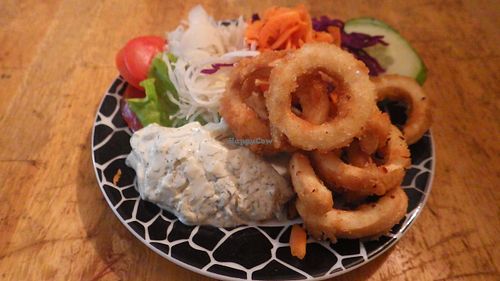 Calamari rings with salad and tartar dip at Yoyo Foodworld in Berlin