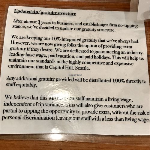 There is already a 10% tip added to your bill they don't tell you about unless you see this very small sign at Ghost Note Coffee in Seattle