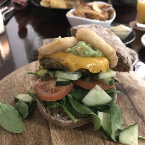 Home made burger with fried onion rings 🤘🏽 at Focus Foodbar in Tilburg