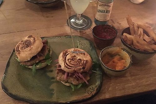 Two sliders, sweet potatoe dip and ginger beer. . Now the sliders are updated; served with vegan mayo and barbecue sauce and the patties are made of sweet potatoes and chickpeas. at Wildebeest Gastropub in Aalborg