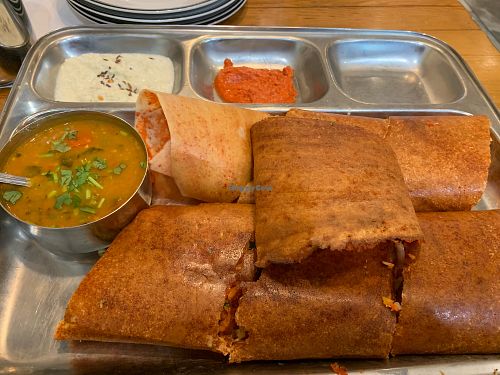 Spring dosa, filled with cabbage, tomatoes, peas, carrots, & onions. at Kesar's in East Windsor