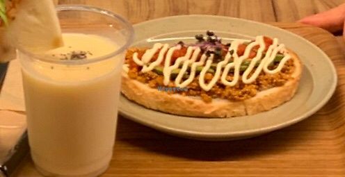 Sandwich with tofu-meat paste. Very delicious. Pineapple taste smoothie. at Rakuen Cafe in Naha