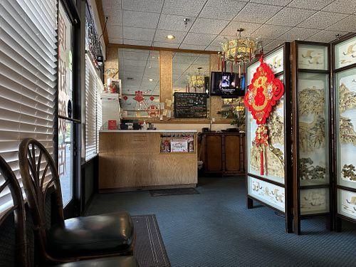 Front counter; seating area for to go   at Ding How in Davis