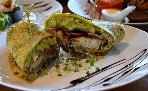 Vegan Burrito w guac, hash browns and mushrooms   at Cafe Home in Blenheim