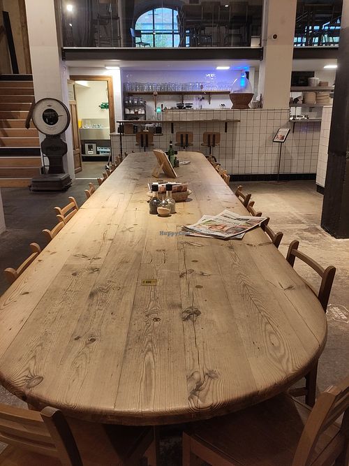 A communal table at Le Pain Quotidien - Ave du Port in Brussels