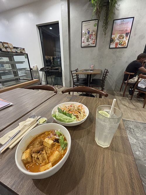 Khao Soi with Lemon Drink; Som Tam  at Veganerie - Silom in Bangkok