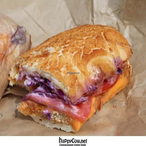 vegan reuben: vegan turkey, homemade poppy seed coleslaw, french dressing, soy cheese at Ike's Place - SF in San Francisco