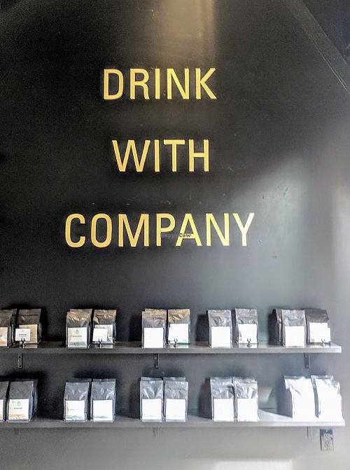 Drinking with company at WithCo Coffee in San Luis Obispo