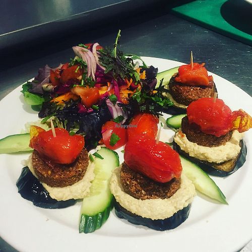  It is one of our best popular vegan meal. falafel grilled aurbergine humus grilled cherry tomato olives and mix salads 
All ingredients are homemade freshly  at De Mezka in North London