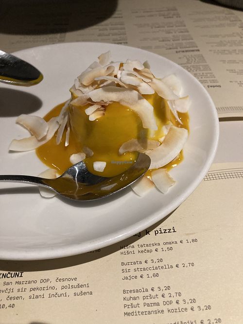 coconut dessert  with mango purée  at Trappa in Ljubljana