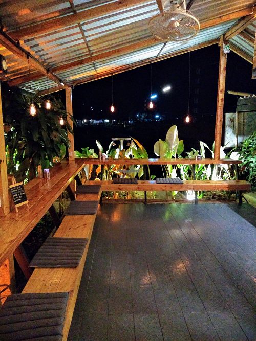 Overlooking the river at night at Friendship Concept in Pai