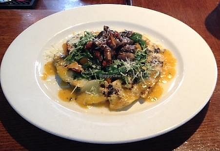Grilled Squash Salad Arugula: basil & roasted butternut squash tossed in a squash vinaigrette on a bed of grilled zucchini & yellow squashed, topped roasted mushroom sundriedtomato at Lucas Wharf in Bodega Bay