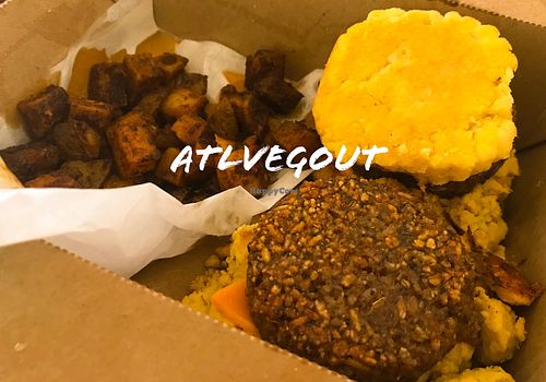 Breakfast sandwich and sweet potato hash  at A Full Taste in Decatur