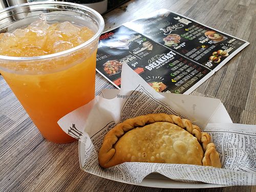 Empanada and juice at Kudough's Donuts in San Juan