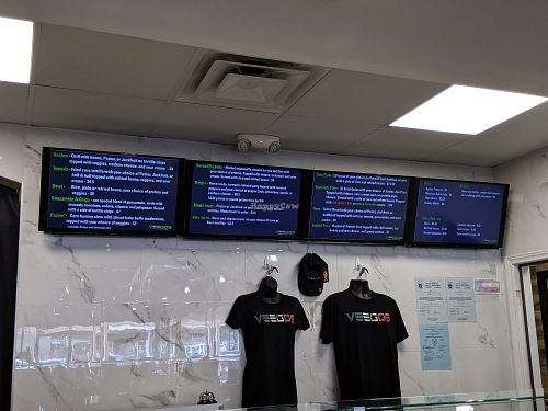 Menu board at Veegos in Houston