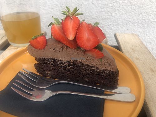 chocolate banana cake with fresh strawberries  at Veganika in Ljubljana