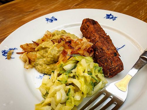 cevapcici with mashed peas, fried onions and cucumber salad at Salé in Prague