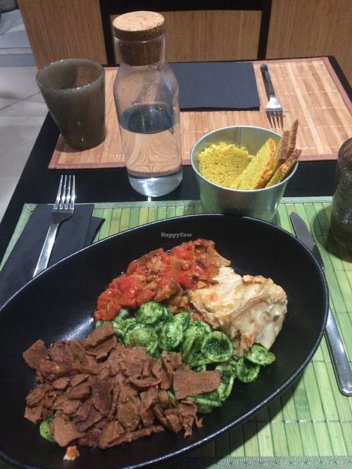 corn bread, lasagna, spicy pesto pasta, seitan and veggies and tofu stripes at Demetra in Milan