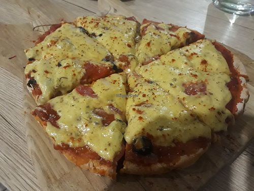 Amazing vegan cheese pizza at Om Burger in Koh Phangan