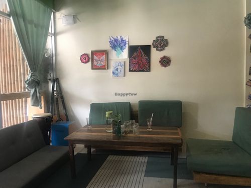 One of the tables inside at Om Burger in Koh Phangan