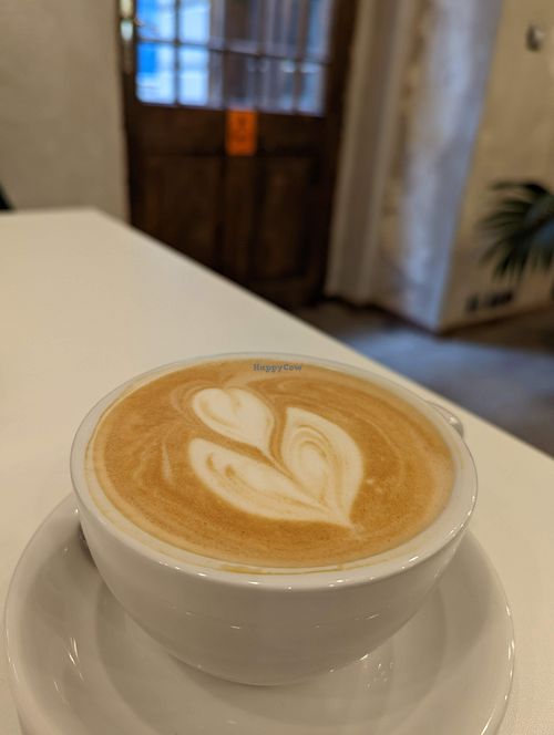Latte with Pea Protein Milk at Flow Specialty Coffee Bar & Bistro in Budapest
