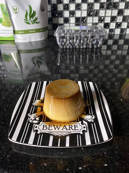 Vegan Flan enjoyed at home (Super Recommend) 😻🍮  at Golden Lotus Vegan Restaurant in Oakland