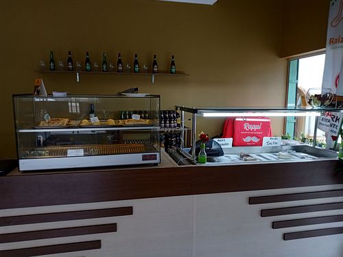 Balcão de salgados e sobremesas at Raízes Zen Cambui in Campinas