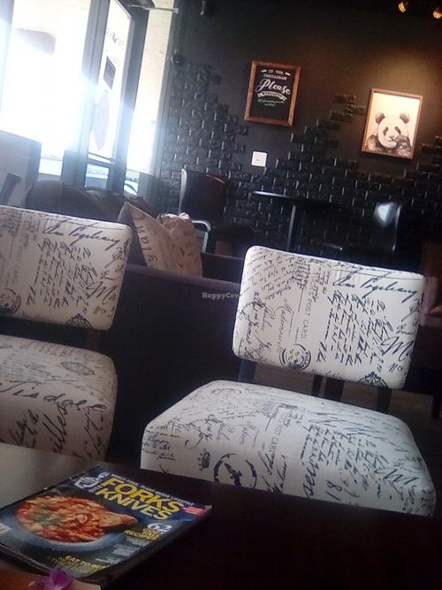 Comfortable seating, free Wi-Fi, good reading, clean unisex bathroom, cozy ambiance, some outdoor seating, free parking out front. at Wisdom's Vegan Bakery & Cafe in Spring