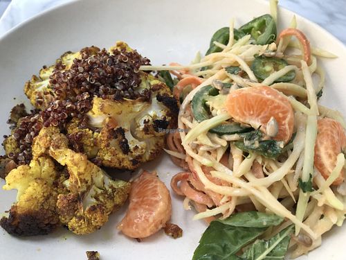 Side plates- cauliflower and Thai papaya salad at Flower Child in Washington