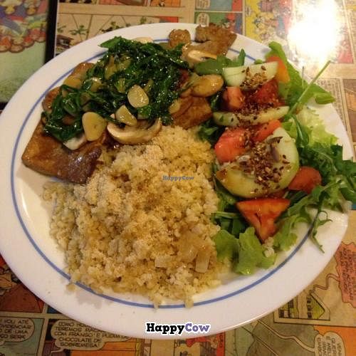 Grilled tofu with spinach, garlic, salad and bulgur at Casa da Horta in Porto