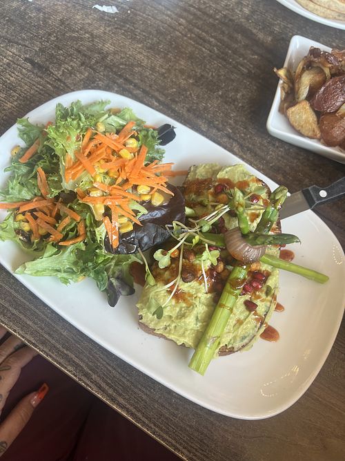 Avacado toast with side salad. Best I ever had.   at Tryst Cafe in Chandler