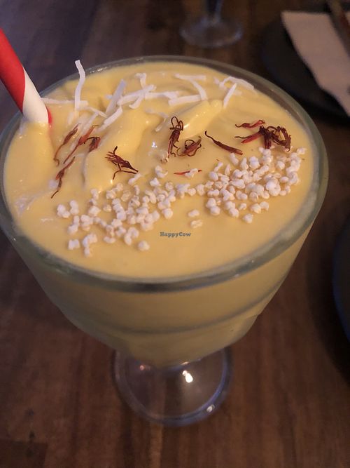 Mango lassi (paper straw) at Nalinis Wholesome Streetfood - Bronte Rd in Waverley