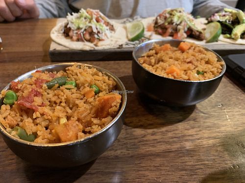 2 sides of rice because beans have pork fat  at TacoCraft in Lauderdale-by-the-sea