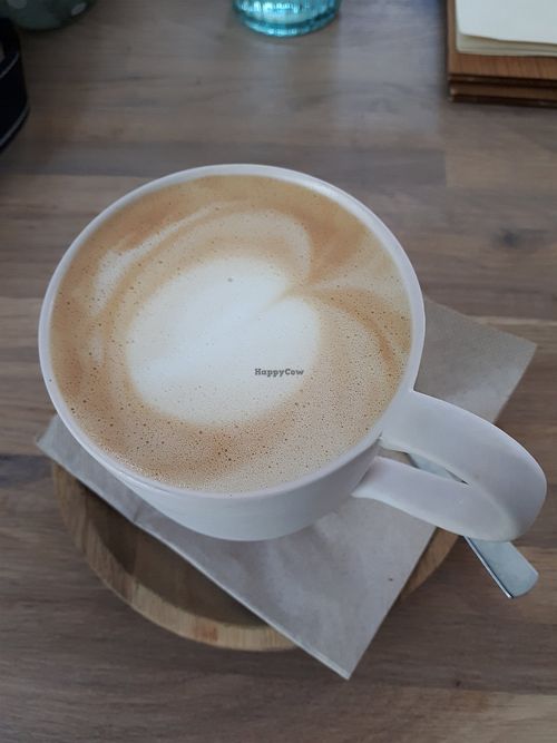 Cappuccino with oat milk at Konvergenz 53 - FrühstücksCafé & TapasBar in Stralsund