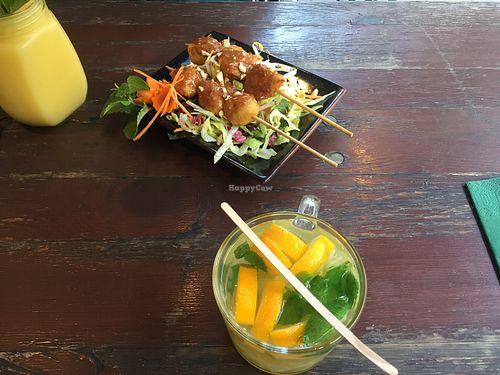 Satay starter, orange and ginger tea, summer breeze shake  at Tiato in Berlin