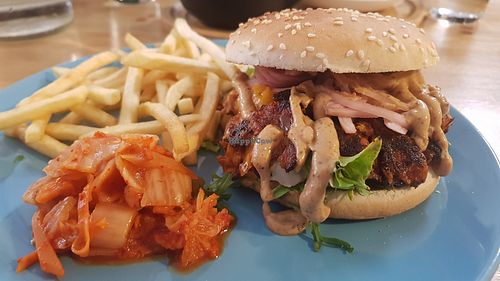 Satan burger with kimchi and fries at The Sly Fox in Edinburgh