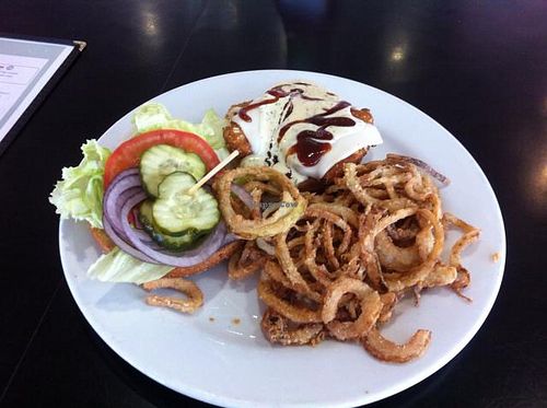 vegan BBQ ranch chicken burger with onion strings at Saturn Cafe in Santa Cruz