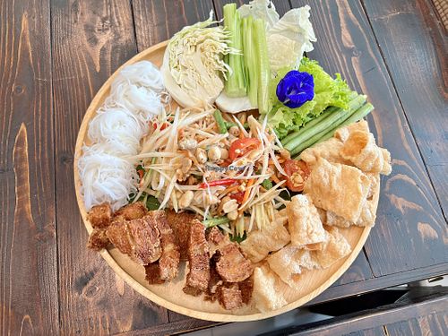 ตำถาด - papaya salad with sides at BlueZone in Bangkok