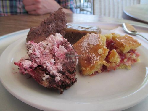 Chocolate Pudding, Toffee Cake, Victoria Sponge Cake and Black Forest Dessert. All vegan.  at Tibits in London