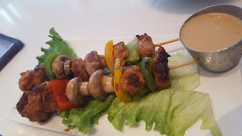 New vegan chicken satay skewers with peanut sauce at Ananda Fuara in San Francisco