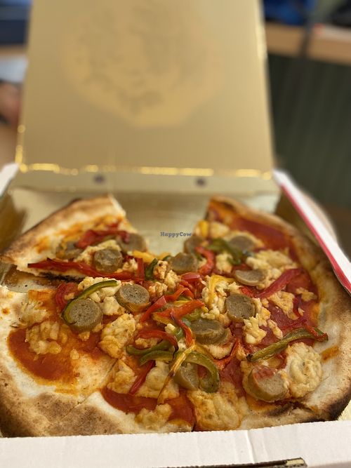 GF Vegan pizza (cashew cheese and sausage) added peppers.  at Amore Mio in Oranjestad