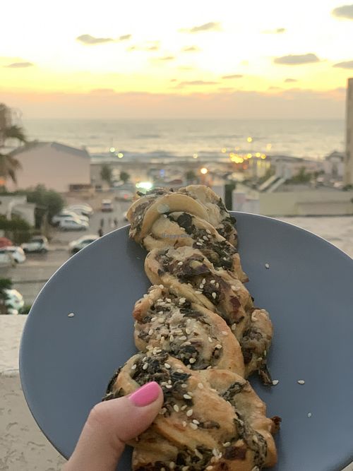 Delicious, flaky, and flavorful bread woven with spinach, mushroom, and cashew cheese... WOW at Vivida in Tel Aviv
