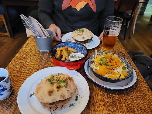 Front no cheese burger, dirty fries, onion rings and beet patty rear at Szabad Bisztro in Budapest