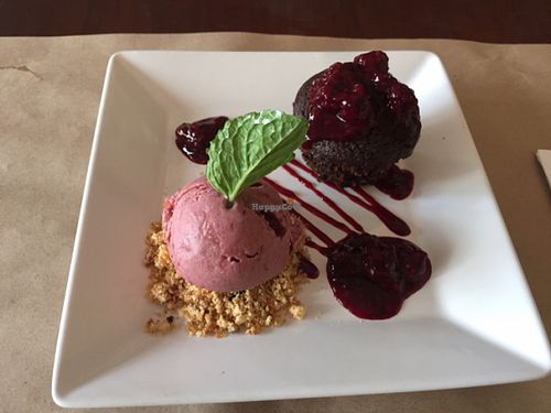 Chocolate cake with red fruits ice cream - deliiiicious. at Banana Verde in Sao Paulo