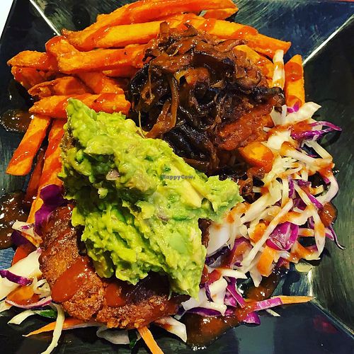 Delicious! Beyond meat burger, sweet potato fries, guacamole, coleslaw, and vegan bacon jam!  at The Brine Well Eatery in Syracuse