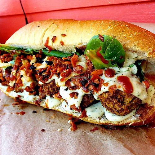 An amazing handmade Vegan Chicken Bacon Swiss Ranch with Micro greens. The flavors and textures are awesome! And, even better, everything they make themselves and in Eugene.  at Screamin' Jay's in Eugene